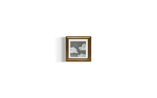 Grey clouds in gold frame